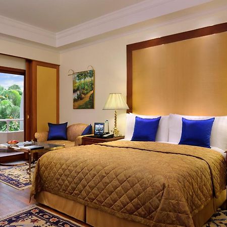 The Oberoi Bengaluru Hotel Exterior photo A room at the Taj Bengal