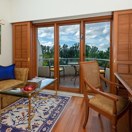 The Oberoi Bengaluru Hotel Exterior photo A room at the Taj Bengal